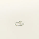 Image of the Thin Band Ear Cuff offers Medium Secure hold for up to 24 hours of comfortable wear. This ear cuff can be adjusted slightly once on the ear, and is ideal for all ear types, including thick/large ears, sensitive ears, small/thin ears, and stretched/healing ears. It is crafted from gold or silver plated copper alloy, with Cubic Zirconia for sparkle. This one-piece ear cuff also doubles as a faux nose piercing.