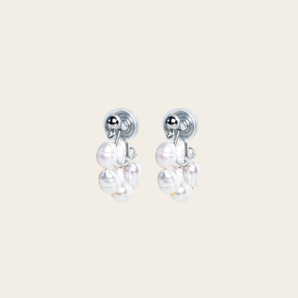 Image of the Blair Clip On Earrings. Our earrings offer a secure 24-hour hold and adjustable fit for all ear types, ideal for sensitive or stretched ears. Elevate your everyday ensemble with a touch of sophistication.