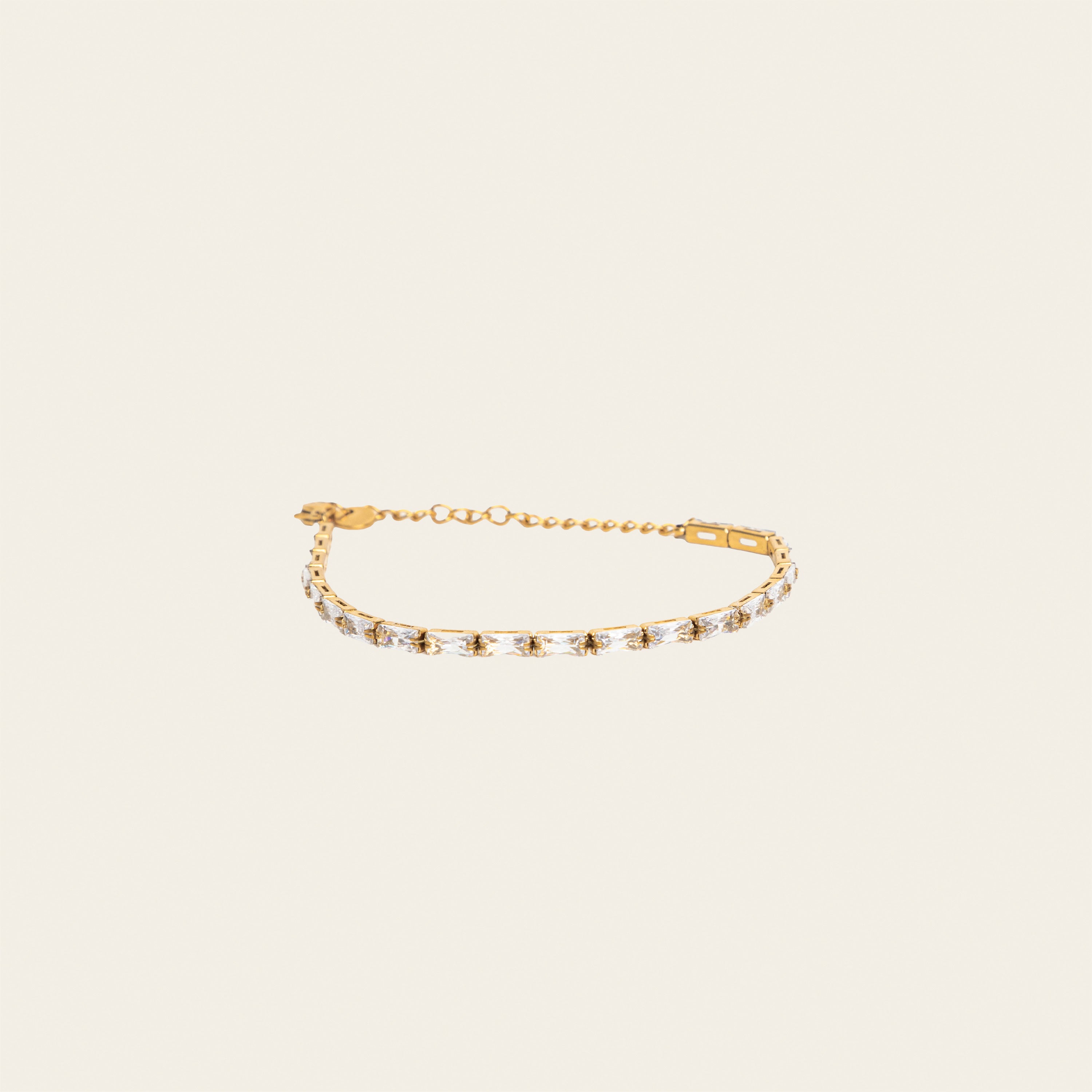 Image of the stunning Elizabeth Bracelet - a perfect blend of fashion and function. With adjustable sizing and 18K gold plated stainless steel, it's both versatile and durable. Enjoy its non-tarnish, water-resistant, and allergy-free properties. Elevate any look with this must-have accessory.