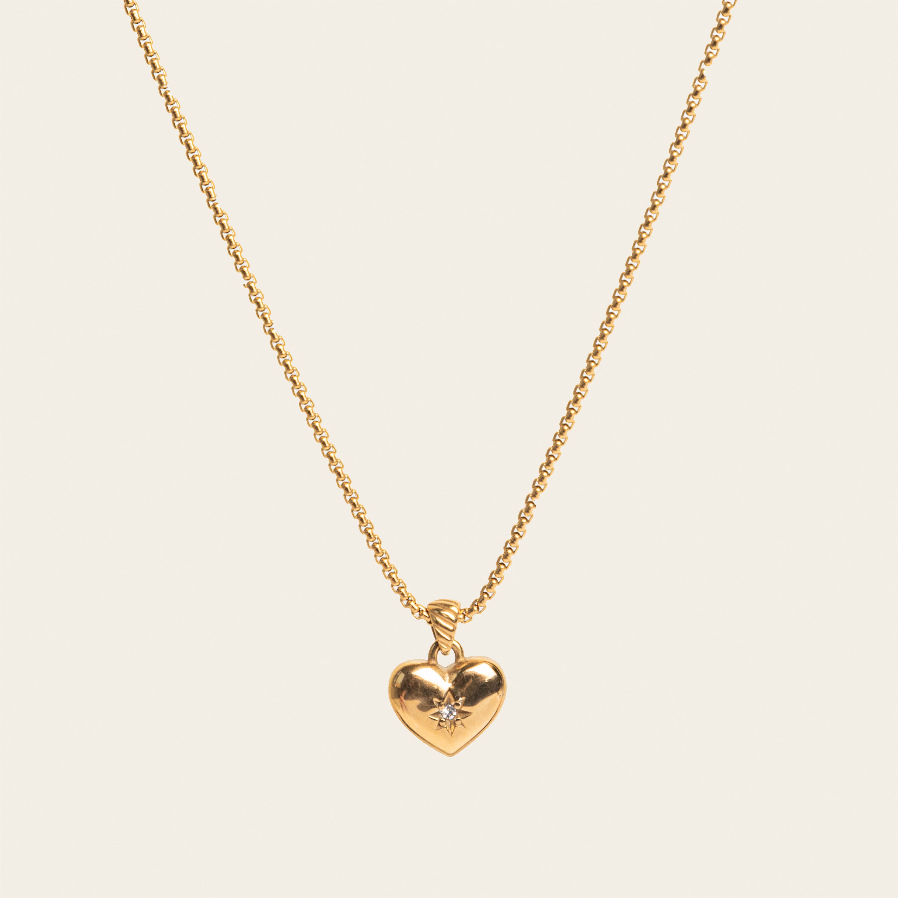 Image of the Jude Heart Necklace is expertly crafted from 18K Gold Plated Stainless Steel, resulting in a durable and water-resistant accessory. Its adjustable chain allows for a customized fit. Elegant and functional, this single necklace is a must-have for any jewelry collection.