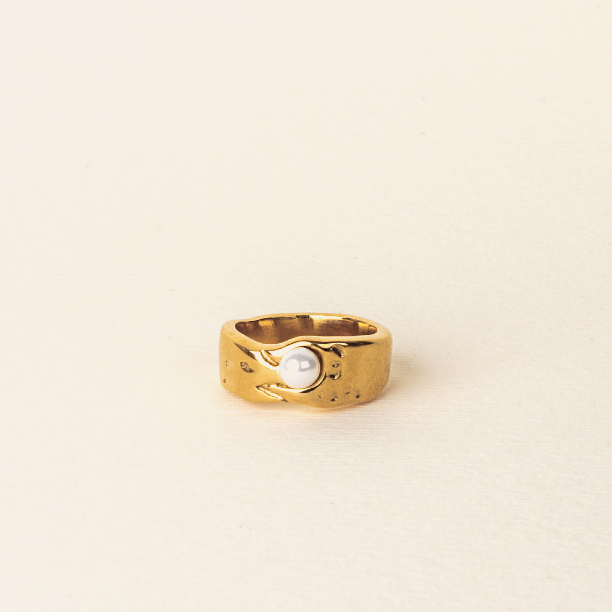 Image of the Madelyn Ring is designed with 18K Gold Plated over Stainless Steel, making it Non-Tarnish and Water Resistant. Adjustment is not possible as the item consists of a single ring.
