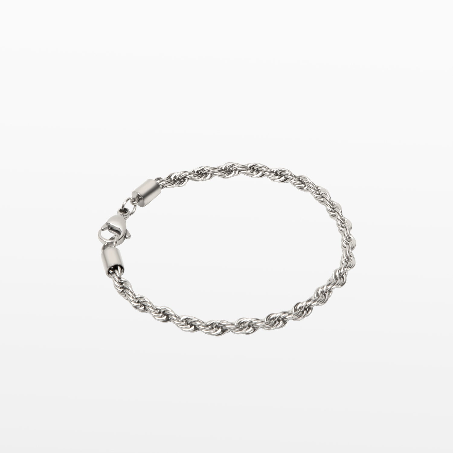 Image of the Twist Rope Chain Bracelet in Silver is crafted from non-tarnish and water-resistant stainless steel, with dimensions of 18 cm in length and 4 mm in width.
