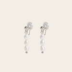 Image of the Audrey Clip On Earrings. These elegant earrings are adjustable for any ear type and provide a secure and comfortable hold for up to 24 hours. Perfect for sensitive or stretched ears, add a touch of sophistication to your daily style.