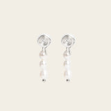 Image of the Audrey Clip On Earrings. These elegant earrings are adjustable for any ear type and provide a secure and comfortable hold for up to 24 hours. Perfect for sensitive or stretched ears, add a touch of sophistication to your daily style.