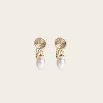 Image of the Elio Clip On Earrings. Designed for all ear types, these elegant earrings provide a secure hold for up to 24 hours. Enjoy unparalleled comfort and style, perfect for those with sensitive or stretched ears. Upgrade your style effortlessly with Elio.