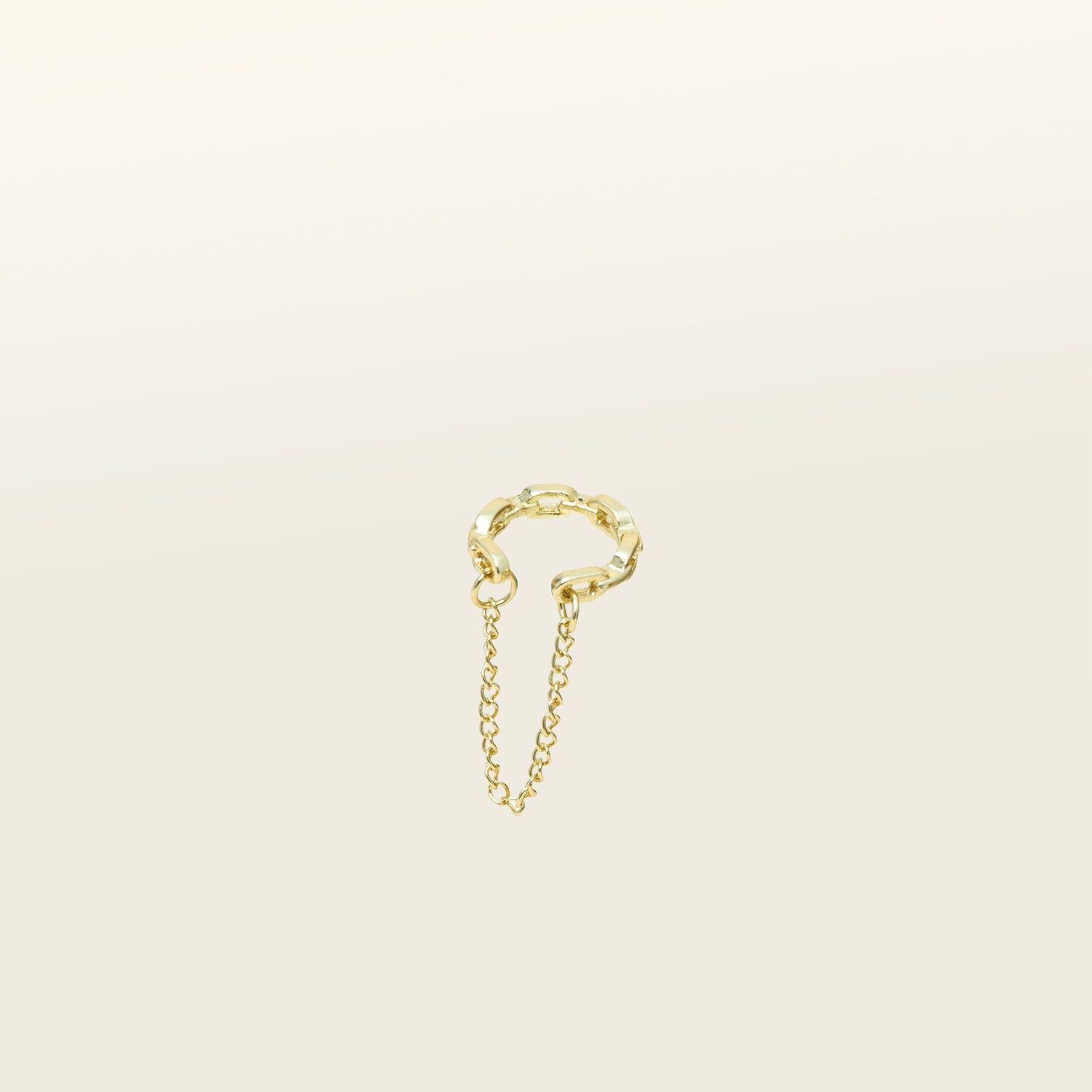 Catalogue Image of a modern Dual Chain Ear Cuff crafted from Goldtone or Silvertone plated zinc alloy. This trendy accessory features a delicate chain, designed to elegantly adorn the earlobe of both men and women.