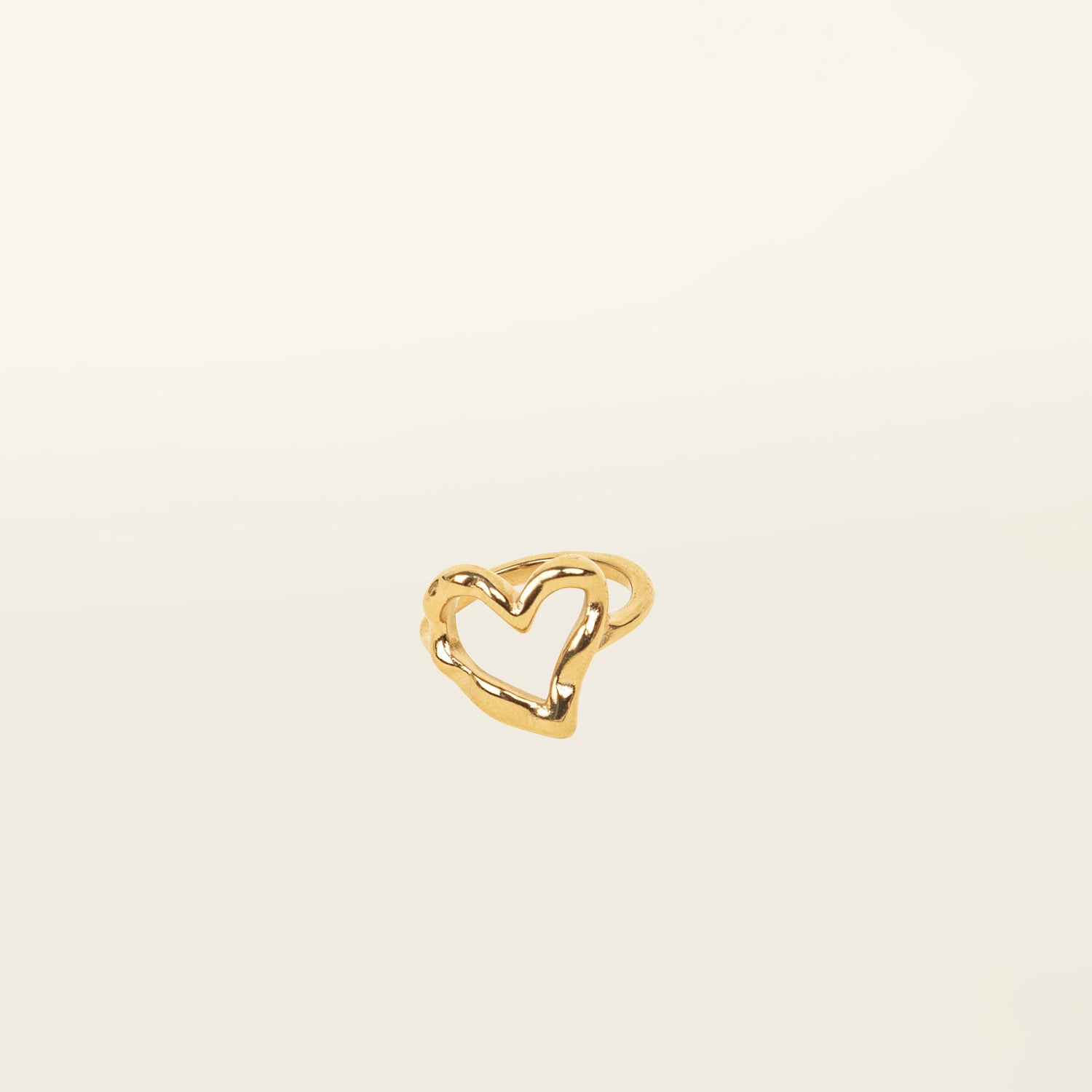 Image of the Ai Heart Ring in Gold is crafted with of 14K Gold Plated Stainless Steel, ensuring a durable and non-tarnishing construction. This piece is also water resistant and made without Lead, Nickel, or Cadmium for added safety. This is a single ring, with no ability to adjust.