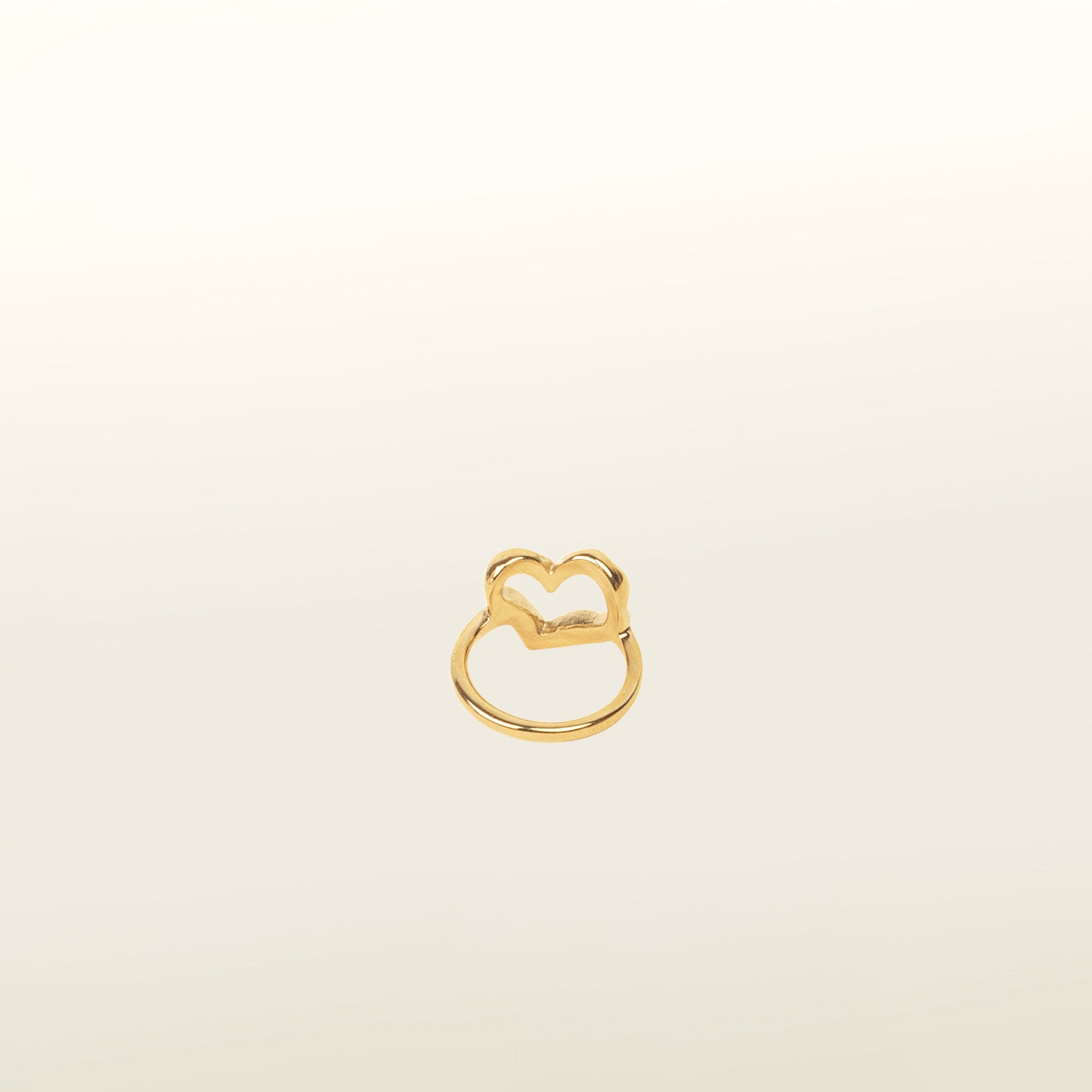 Image of the Ai Heart Ring in Gold is crafted with of 14K Gold Plated Stainless Steel, ensuring a durable and non-tarnishing construction. This piece is also water resistant and made without Lead, Nickel, or Cadmium for added safety. This is a single ring, with no ability to adjust.