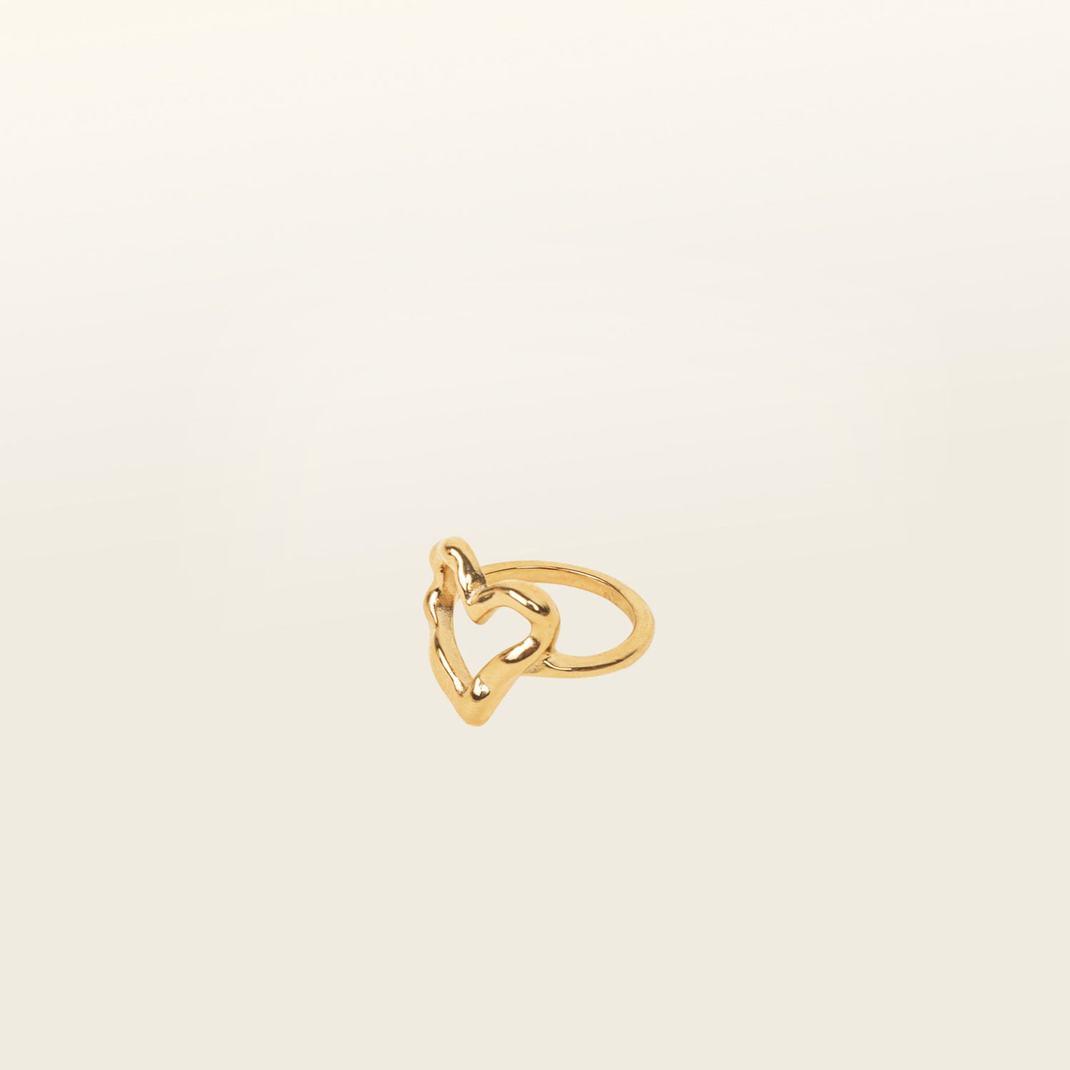 Image of the Ai Heart Ring in Gold is crafted with of 14K Gold Plated Stainless Steel, ensuring a durable and non-tarnishing construction. This piece is also water resistant and made without Lead, Nickel, or Cadmium for added safety. This is a single ring, with no ability to adjust.