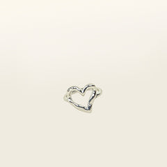 Image of the Ai Heart Ring in Silver is crafted with of 14K Gold Plated Stainless Steel, ensuring a durable and non-tarnishing construction. This piece is also water resistant and made without Lead, Nickel, or Cadmium for added safety. This is a single ring, with no ability to adjust.