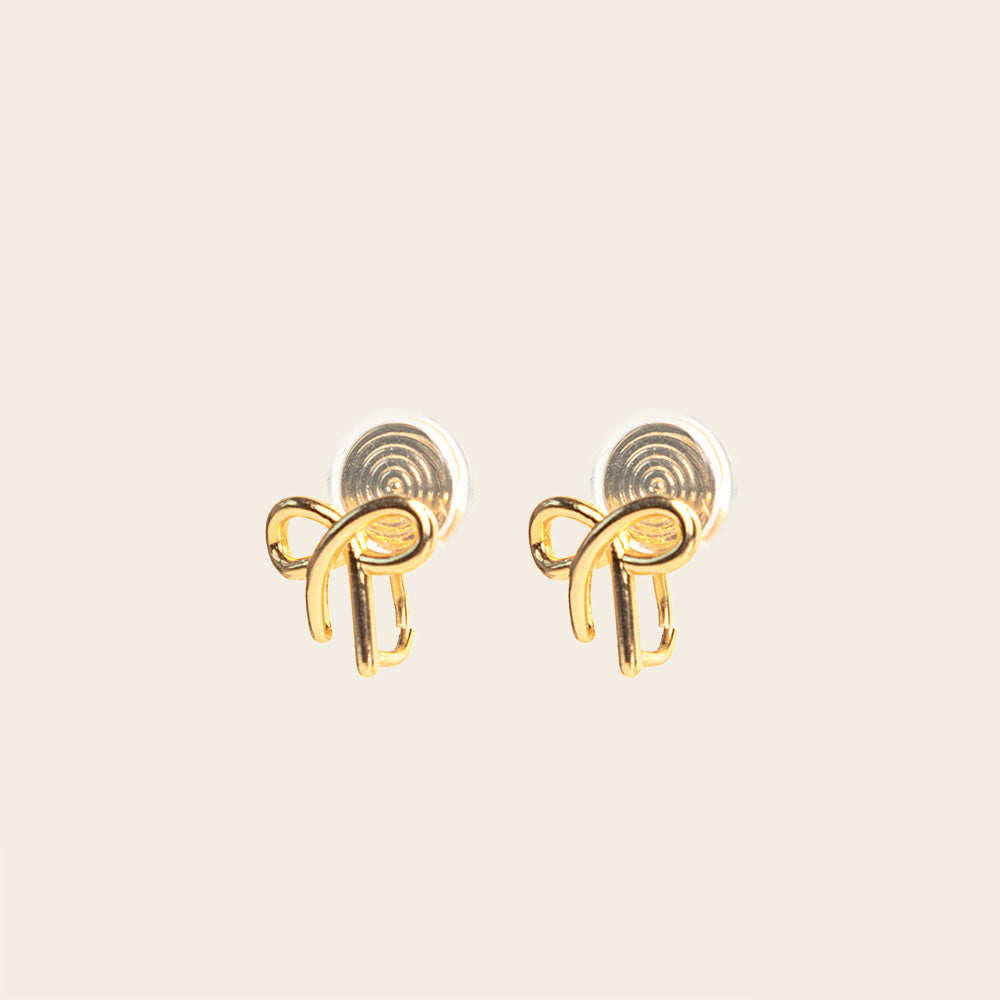 Alice Clip On Earrings. With a special mosquito coil clip-on design, these earrings fit all ear types, from thick and sensitive to small and keloid prone. Enjoy 24 hours of comfortable wear and a medium secure hold, perfect for all-day wear.