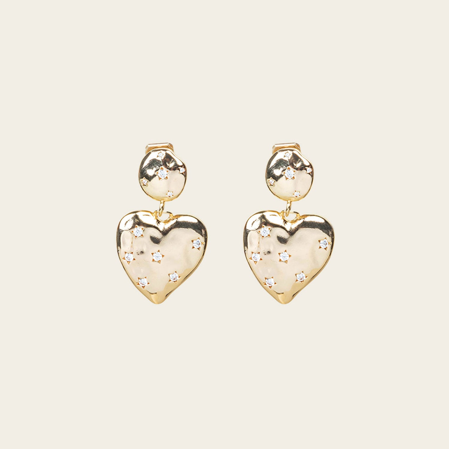 Image of the Amore Clip On Earrings in Gold offer a secure, padded closure type for a comfortable wear of 8-12 hours that is suitable for all ear types. This single pair features stainless steel and cubic zirconia construction and is non-tarnish and water resistant. Note: The clip-on earring has removable rubber padding.
