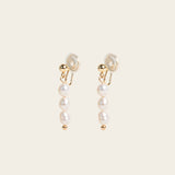 Image of the Audrey Clip On Earrings. These elegant earrings are adjustable for any ear type and provide a secure and comfortable hold for up to 24 hours. Perfect for sensitive or stretched ears, add a touch of sophistication to your daily style.