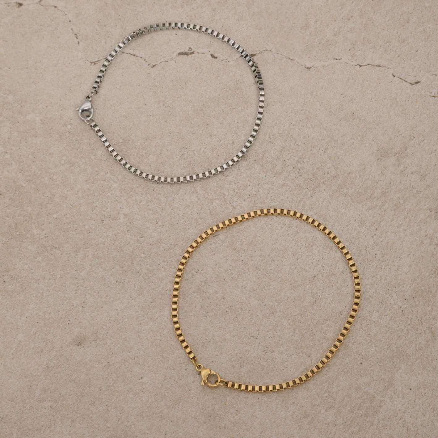 Image of the Box Chain Bracelet in Gold is 18K Gold Plated, offering a non-tarnish, water-resistant finish.