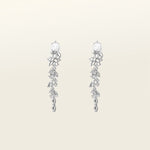Image of the Cascade Chandelier Clip On Earrings, effortless elegance is yours with these Clip-On Hoop Earrings. Crafted from a luxurious combination of Silver tone copper alloy and Cubic Zirconia, these stylish earrings provide secure closure with their removable rubber padding. Lead/Nickel/Cadmium free, these glamorous earrings are the perfect addition to any ensemble.