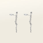 Image of the Cascade Chandelier Clip On Earrings, effortless elegance is yours with these Clip-On Hoop Earrings. Crafted from a luxurious combination of Silver tone copper alloy and Cubic Zirconia, these stylish earrings provide secure closure with their removable rubber padding. Lead/Nickel/Cadmium free, these glamorous earrings are the perfect addition to any ensemble.