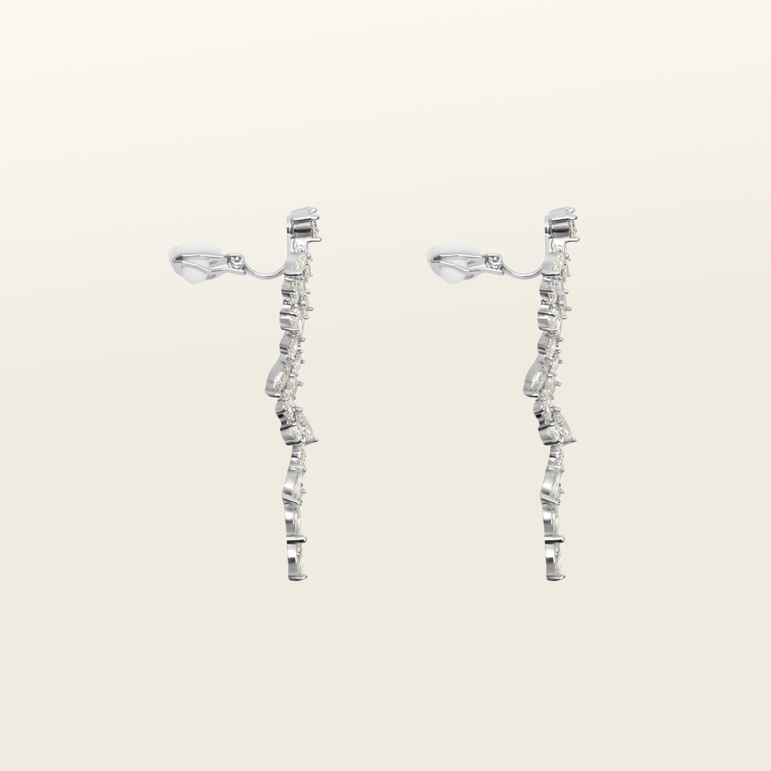 Image of the Cascade Chandelier Clip On Earrings, effortless elegance is yours with these Clip-On Hoop Earrings. Crafted from a luxurious combination of Silver tone copper alloy and Cubic Zirconia, these stylish earrings provide secure closure with their removable rubber padding. Lead/Nickel/Cadmium free, these glamorous earrings are the perfect addition to any ensemble.