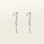 Image of the Cascade Chandelier Clip On Earrings, effortless elegance is yours with these Clip-On Hoop Earrings. Crafted from a luxurious combination of Silver tone copper alloy and Cubic Zirconia, these stylish earrings provide secure closure with their removable rubber padding. Lead/Nickel/Cadmium free, these glamorous earrings are the perfect addition to any ensemble.