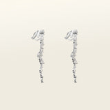 Image of the Cascade Chandelier Clip On Earrings, effortless elegance is yours with these Clip-On Hoop Earrings. Crafted from a luxurious combination of Silver tone copper alloy and Cubic Zirconia, these stylish earrings provide secure closure with their removable rubber padding. Lead/Nickel/Cadmium free, these glamorous earrings are the perfect addition to any ensemble.