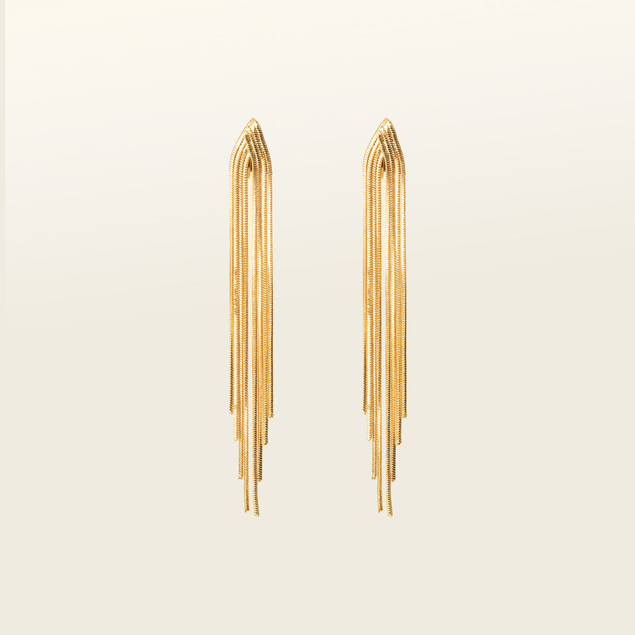 Image of the Chain Chandelier Clip On Earrings in Gold embody a removable rubber padding for secure yet comfortable holding of all ear types, with up to 12 hours of wear. This single pair, fashioned from gold tone copper alloy, offers an immediate air of refinement and distinction.