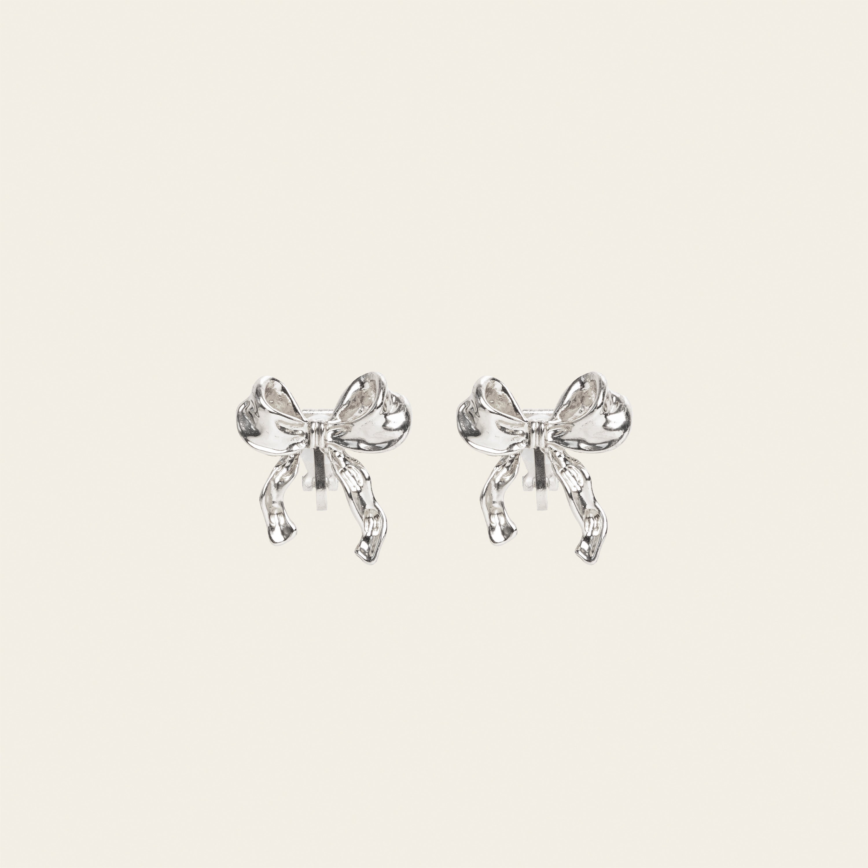 Image of the Charlie Clip On Earrings. Our expertly crafted earrings provide a 24-hour hold and adjustable fit for sensitive or stretched ears. Elevate your style with effortless elegance.