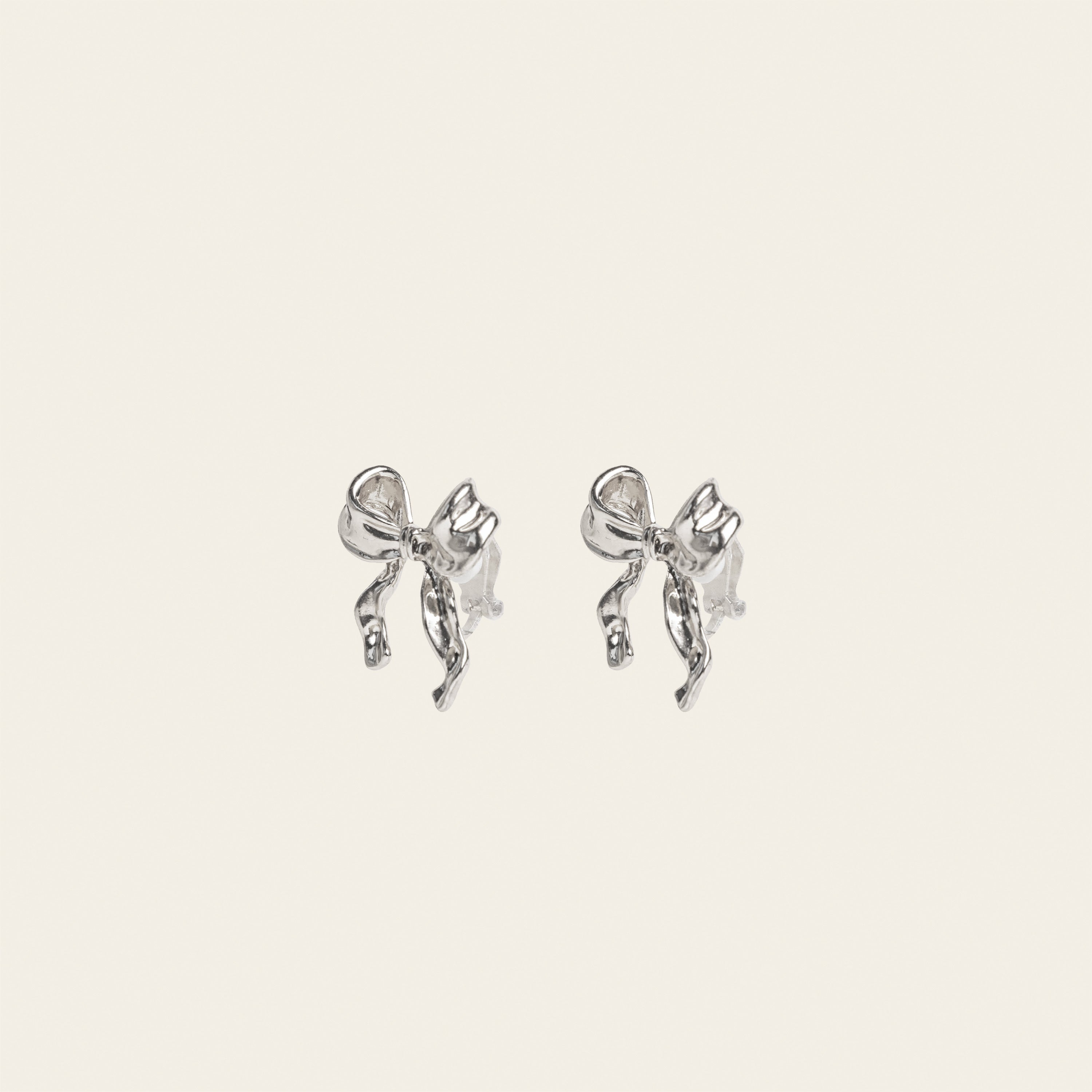 Image of the Charlie Clip On Earrings. Our expertly crafted earrings provide a 24-hour hold and adjustable fit for sensitive or stretched ears. Elevate your style with effortless elegance.