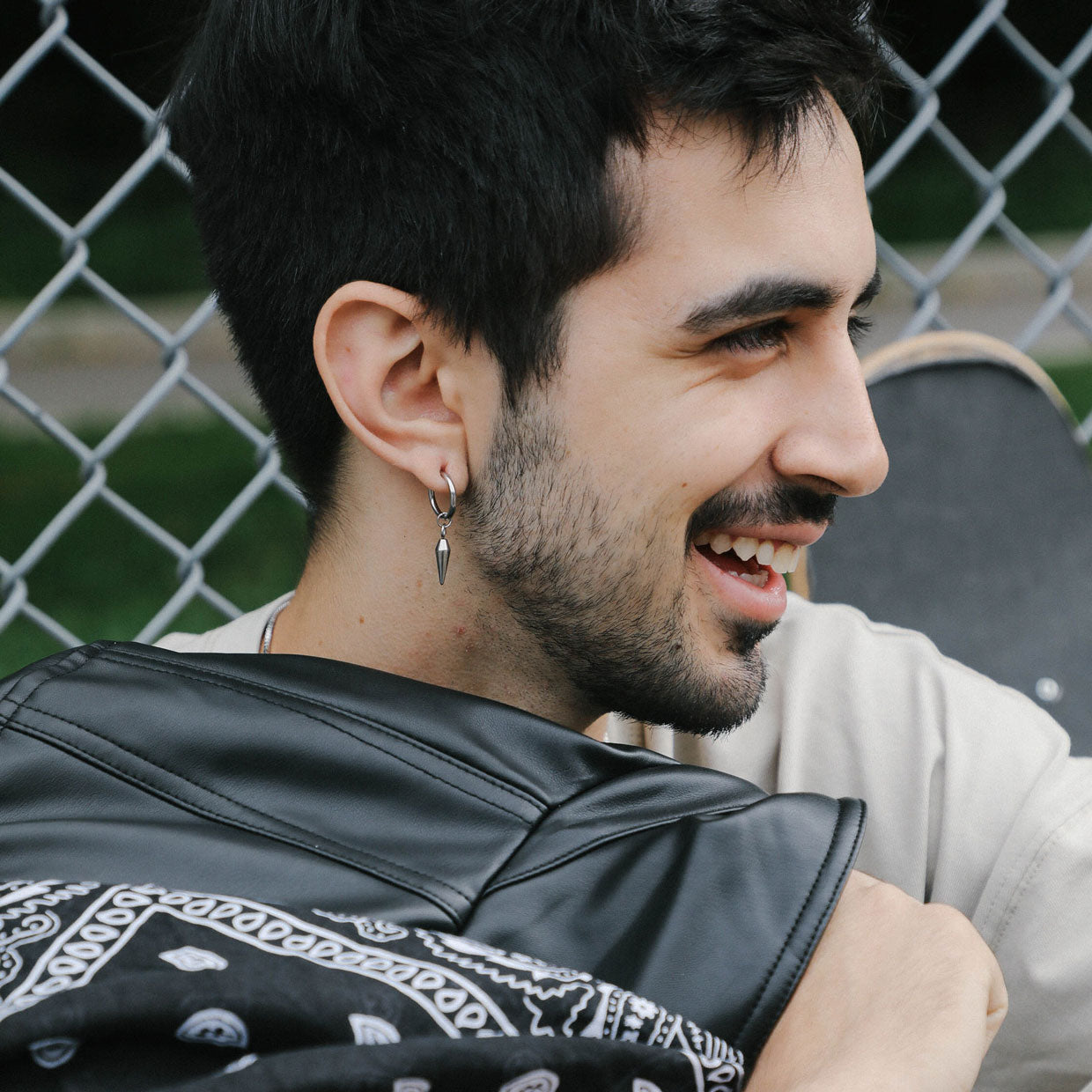 A model wearing the Dagger Clip On Earrings feature a sliding spring closure type, making them best suited to those with small or thin ears. The earrings are capable of providing a secure hold for an average of 2-4 hours, and have the ability to adjust automatically to the thickness of your earlobes. Crafted from stainless steel, each pair includes a single set of earrings.