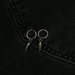Image of the Dagger Clip On Earrings feature a sliding spring closure type, making them best suited to those with small or thin ears. The earrings are capable of providing a secure hold for an average of 2-4 hours, and have the ability to adjust automatically to the thickness of your earlobes. Crafted from stainless steel, each pair includes a single set of earrings.