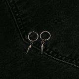 Image of the Dagger Clip On Earrings feature a sliding spring closure type, making them best suited to those with small or thin ears. The earrings are capable of providing a secure hold for an average of 2-4 hours, and have the ability to adjust automatically to the thickness of your earlobes. Crafted from stainless steel, each pair includes a single set of earrings.
