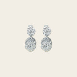 Image of the Daiquiri Drop Clip On Earrings in Silver feature a secure, padded clip-on closure ideal for all ear types, offering up to 12 hours of comfortable wear. Crafted from Zinc and Copper alloy, these earrings come as a single pair with removable rubber padding.