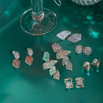 Image of the Daiquiri Drop Clip On Earrings in Silver feature a secure, padded clip-on closure ideal for all ear types, offering up to 12 hours of comfortable wear. Crafted from Zinc and Copper alloy, these earrings come as a single pair with removable rubber padding.