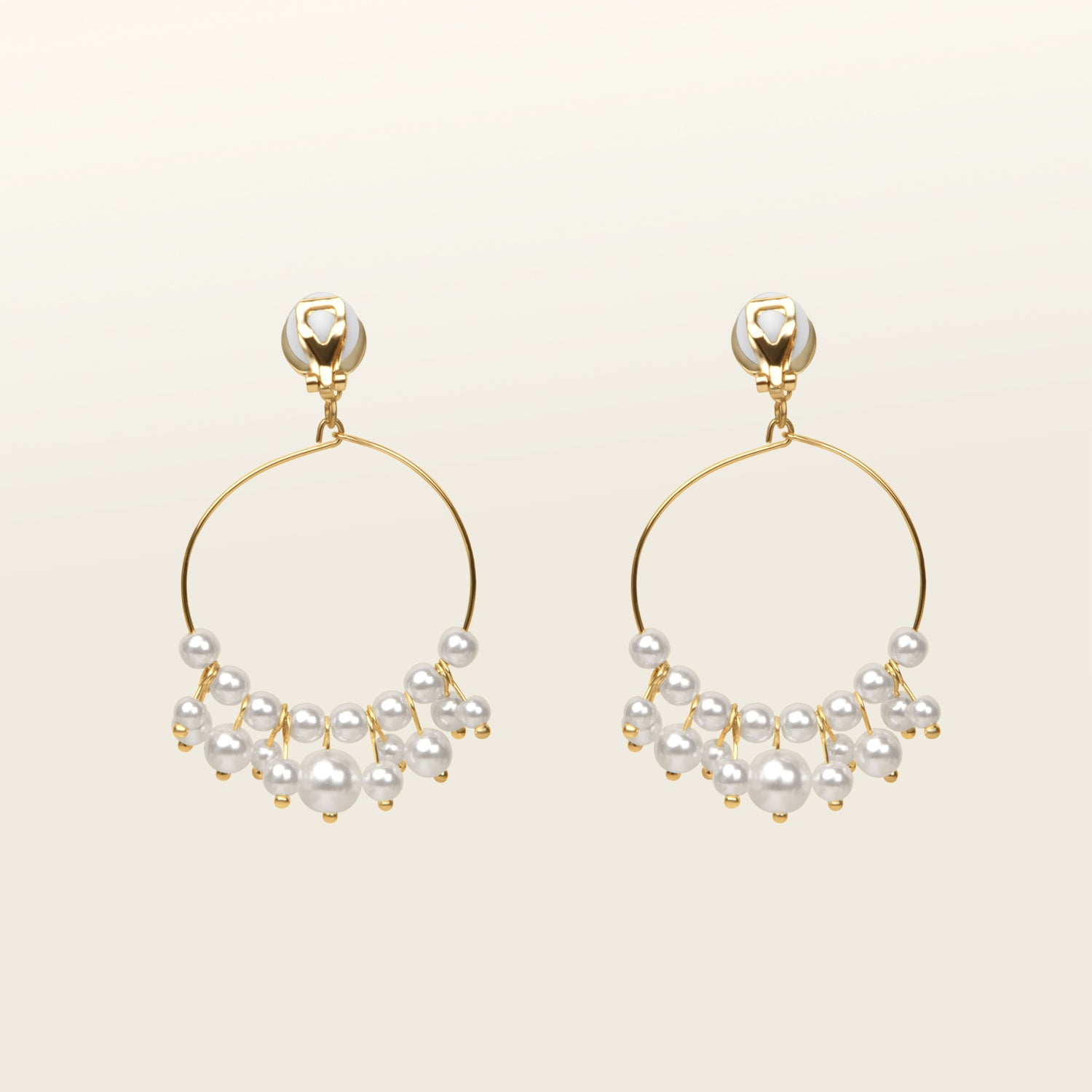 Image of the Delphine Clip On Earrings feature a gold-tone copper alloy and a Simulated Faux Pearl. The closure type is a padded clip-on earring with removable rubber padding, making it ideal for all ear types (including thick/large ears, sensitive ears, small/thin ears, and stretched/healing ears). You can expect a secure hold for up to 12 hours of comfortable wear. Please note that this item is sold as a single pair.