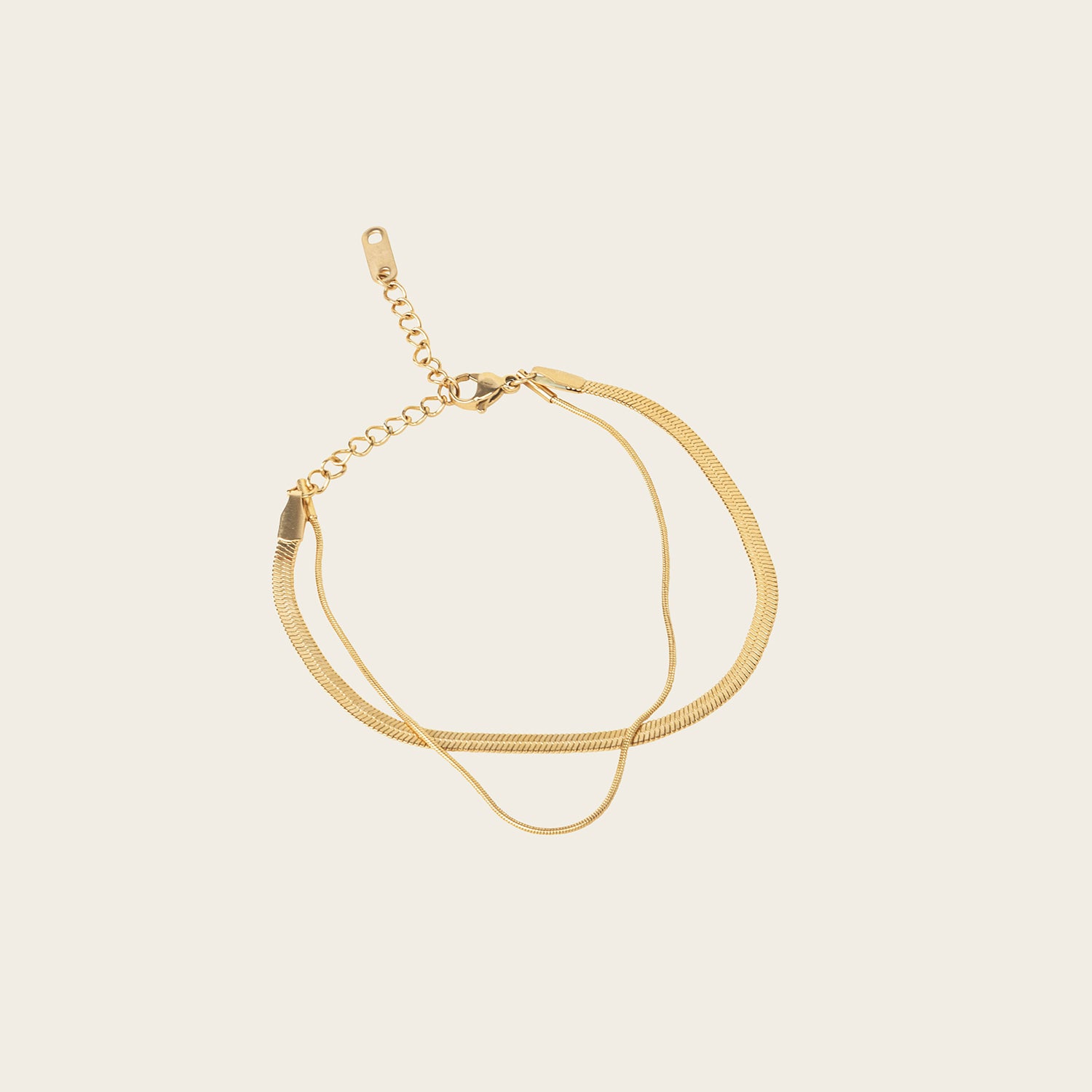 Image of the Double Layered Bracelet is crafted from 14K gold plated stainless steel for outstanding durability and a non-tarnish, water-resistant, allergy-free and antioxidant finish. Plus, its adjustable design ensures a perfect fit for any wrist.