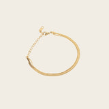 Image of the Double Layered Bracelet is crafted from 14K gold plated stainless steel for outstanding durability and a non-tarnish, water-resistant, allergy-free and antioxidant finish. Plus, its adjustable design ensures a perfect fit for any wrist.