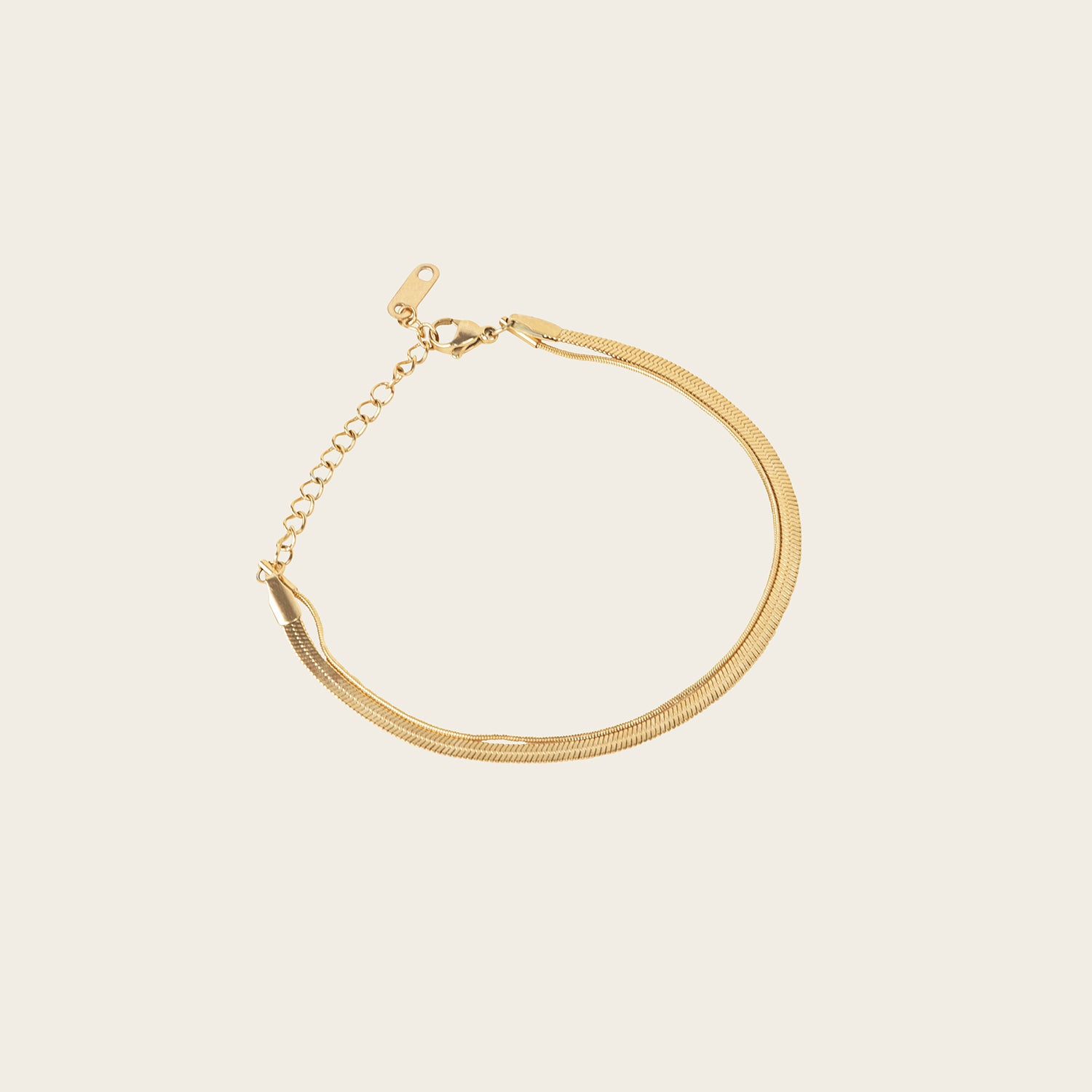 Image of the Double Layered Bracelet is crafted from 14K gold plated stainless steel for outstanding durability and a non-tarnish, water-resistant, allergy-free and antioxidant finish. Plus, its adjustable design ensures a perfect fit for any wrist.