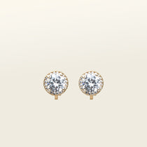 Image of the Harper Stud Clip On Earrings in Gold are ideal for any ear type, offering a secure hold for up to 12 hours of comfortable wear. Crafted from gold tone copper alloy and Cubic Zirconia, the earrings feature a padded clip-on closure and removable rubber padding. Please note the item is for one pair only.