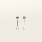 Silver-plated brass mosquito coil clip-on earrings adorned with lustrous freshwater pearls. Suitable for all ear types, offering a medium secure hold for comfortable 24-hour wear. 