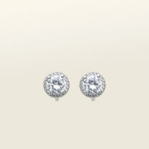 Image of the Harper Stud clip-on earrings features a secure hold, with a maximum comfortable wear duration of 8 to 12 hours. It is ideal for all ear types, including thick/large, sensitive, small/thin, and stretched/healing types. It is made with a silver-tone copper alloy and cubic zirconia, and comes with a removable rubber padding for added comfort. Please note: only one pair is included.