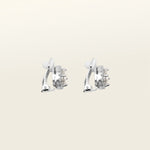 Image of the Harper Stud clip-on earrings features a secure hold, with a maximum comfortable wear duration of 8 to 12 hours. It is ideal for all ear types, including thick/large, sensitive, small/thin, and stretched/healing types. It is made with a silver-tone copper alloy and cubic zirconia, and comes with a removable rubber padding for added comfort. Please note: only one pair is included.