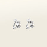 Image of the Harper Stud clip-on earrings features a secure hold, with a maximum comfortable wear duration of 8 to 12 hours. It is ideal for all ear types, including thick/large, sensitive, small/thin, and stretched/healing types. It is made with a silver-tone copper alloy and cubic zirconia, and comes with a removable rubber padding for added comfort. Please note: only one pair is included.