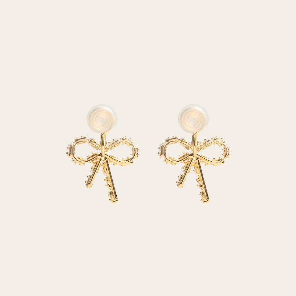 Image of the Jane Clip On Earrings! These stylish and versatile earrings are perfect for non-pierced ears, featuring a secure hold for up to 24 hours. With an adjustable fit and suitability for sensitive or stretched ears, they're the perfect accessory for any occasion.