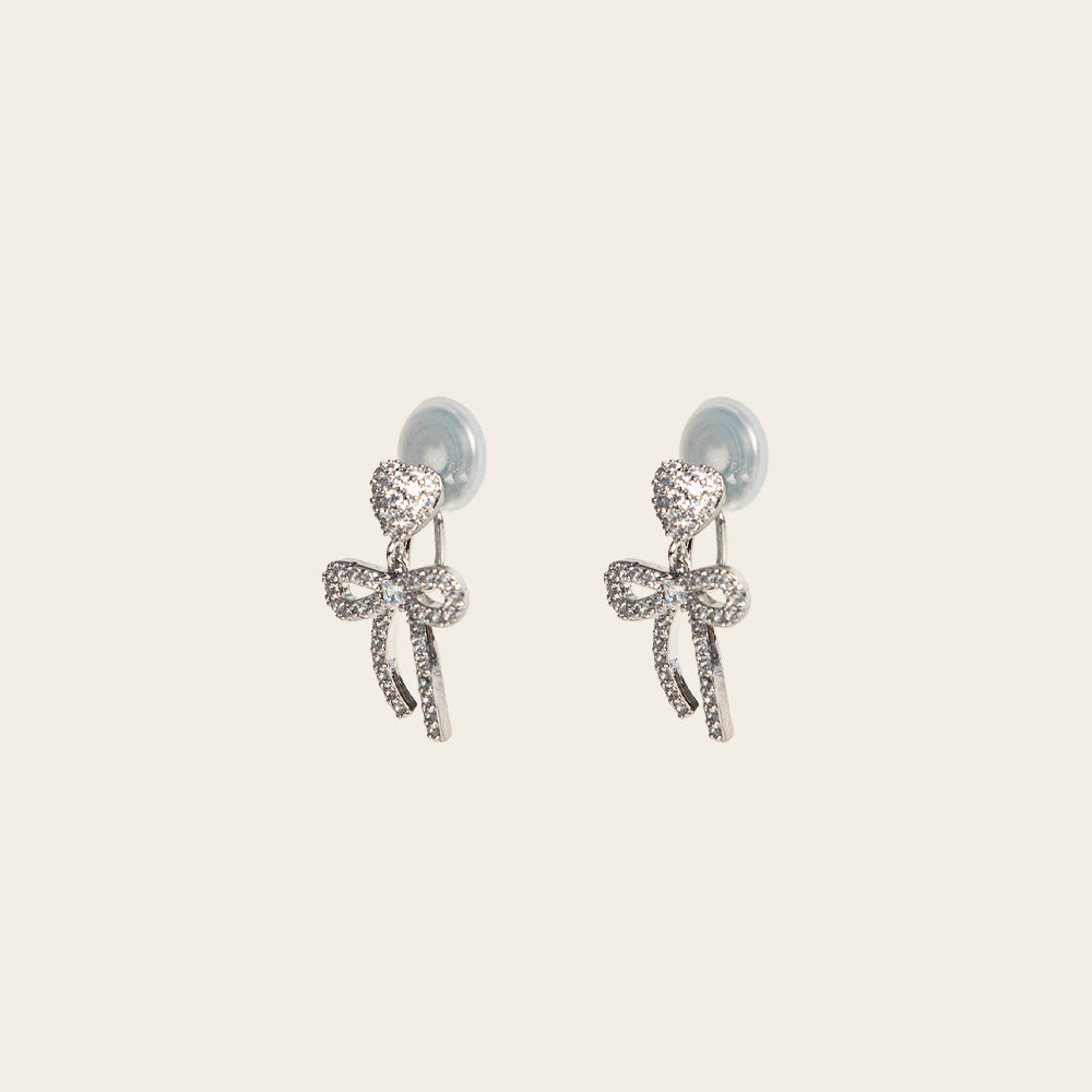 Image of the Lara Clip On Earrings. With a secure hold for up to 24 hours, these versatile and stylish earrings are suitable for all ear types and easily adjustable. Perfect for sensitive or stretched ears, they provide medium strength for a comfortable and hassle-free experience.