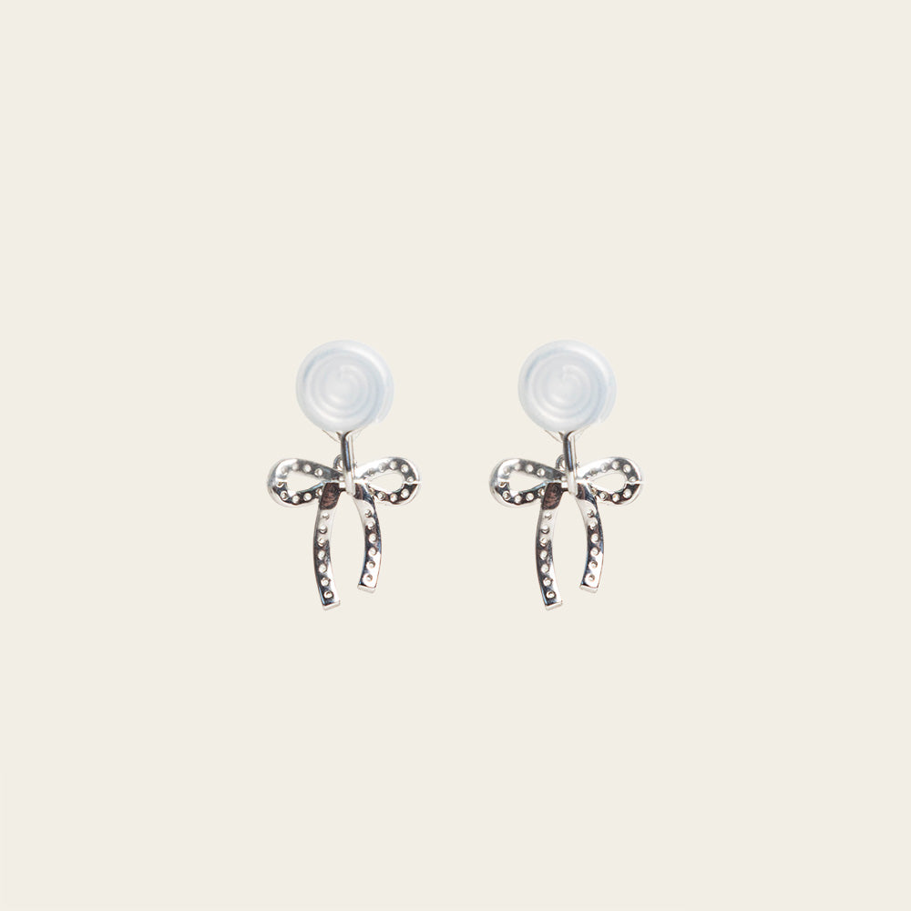 Image of the Lara Clip On Earrings. With a secure hold for up to 24 hours, these versatile and stylish earrings are suitable for all ear types and easily adjustable. Perfect for sensitive or stretched ears, they provide medium strength for a comfortable and hassle-free experience.