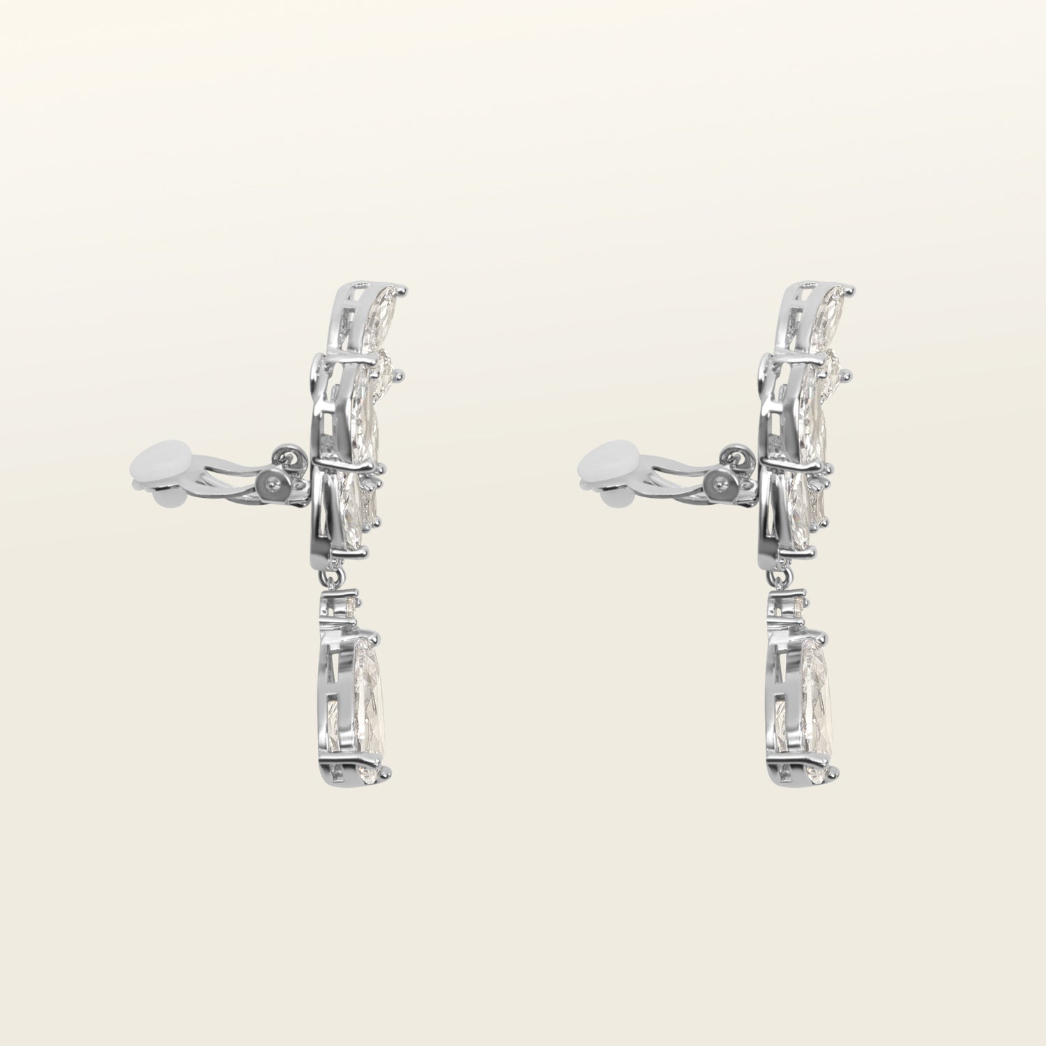 Image of the Layla Clip-On Earrings boast a secure and comfortable hold that can last up to 12 hours. Features include a padding clip-on closure, making it suitable for all ear types including thick, sensitive, thin, and stretched ears. Made from a silver plated, copper alloy and free of lead, nickel, and cadmium, this single pair of earrings is perfect for long-lasting wear. The removable rubber padding further promises an adjustable, comfortable fit.