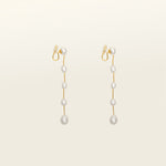 Image of the Lune Pearl Clip-On Earrings in Gold feature a unique, secure mosquito coil clasp. They are ideal for all ear types, from thick and large ears to sensitive and small. With medium hold strength, the earrings can be comfortably worn up to 24 hours and easily adjusted. Crafted with freshwater pearls, each pair may display natural variations in size and color. Materials include freshwater pearl and 18K gold-plated stainless steel.