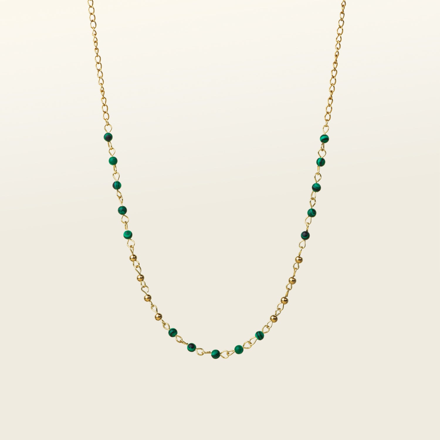Image of the Lyra Chain Necklace is adjustable for your comfort and convenience. It is crafted from 18K Gold Plated Stainless Steel, with a Natural Malachite stone embedded in the chain for a stunning look. This product is non-tarnish and waterproof for lasting usage.