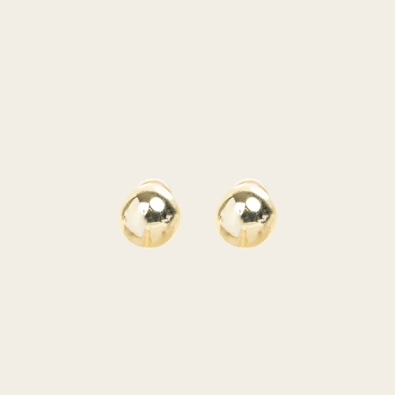 Image of the Olive Clip On Earrings feature a Mosquito Coil Clip-On closure type, ideal for all ear types. Average comfortable wear duration is 24 hours, with a medium secure hold. These earrings are adjustable; gently squeeze the padding forward once they are on the ear. Materials are gold tone copper. Please note, item is only one pair.