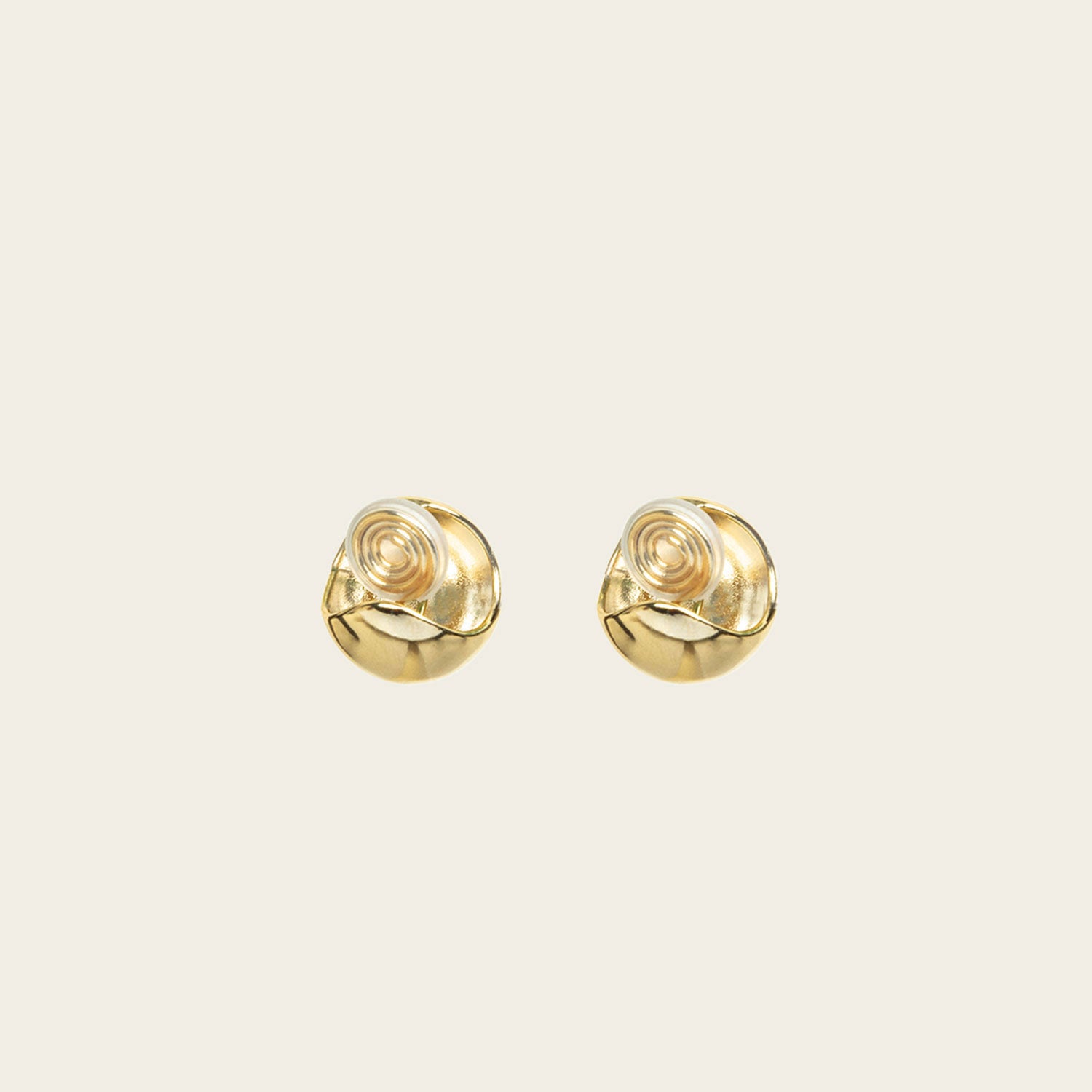 Image of the Olive Clip On Earrings feature a Mosquito Coil Clip-On closure type, ideal for all ear types. Average comfortable wear duration is 24 hours, with a medium secure hold. These earrings are adjustable; gently squeeze the padding forward once they are on the ear. Materials are gold tone copper. Please note, item is only one pair.