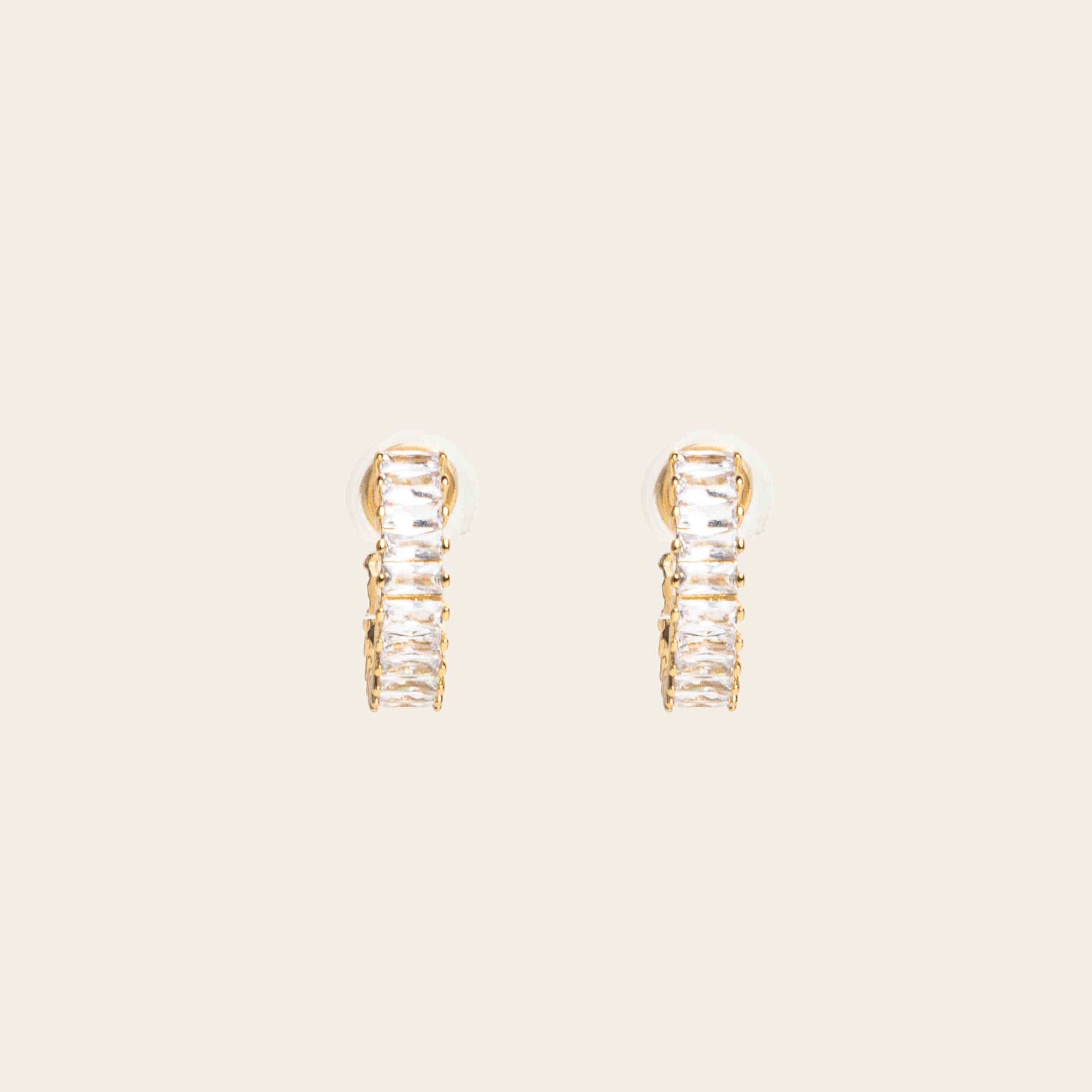 Image of the Olivia Clip On Earrings. These elegant earrings provide a secure 24-hour hold and adjustable fit for all types of ears, perfect for sensitive or stretched ears. Elevate your everyday look confidently with Olivia Clip On Earrings, designed for ultimate comfort and style.