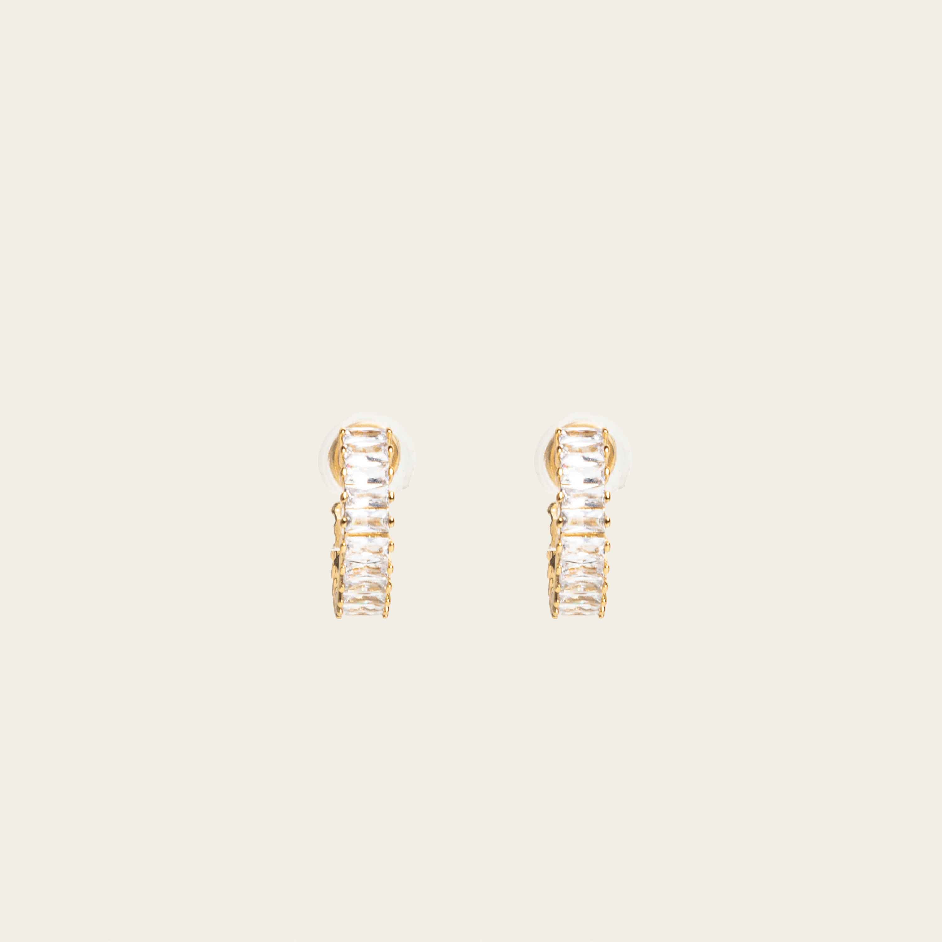 Image of the Olivia Clip On Earrings. These elegant earrings provide a secure 24-hour hold and adjustable fit for all types of ears, perfect for sensitive or stretched ears. Elevate your everyday look confidently with Olivia Clip On Earrings, designed for ultimate comfort and style.